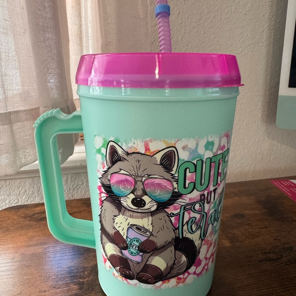 Mint Green Raccoon Trucker mug with Pink Lid